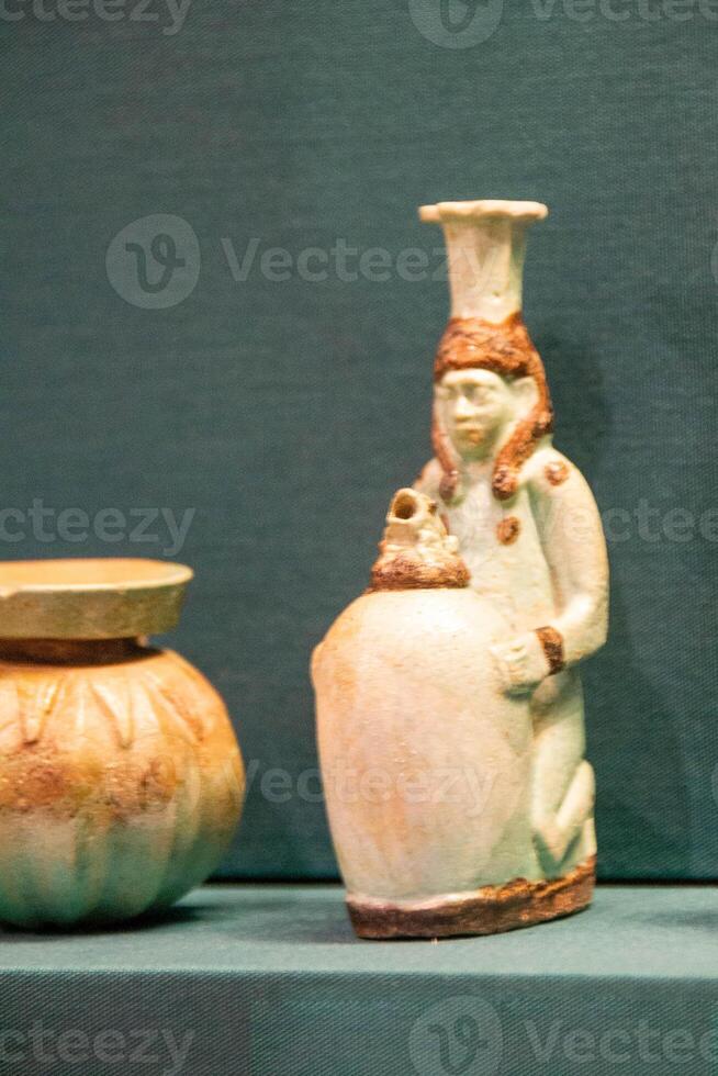 Antique ceramic decorative amphora on a white background photo