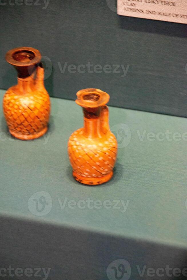 Antique ceramic decorative amphora on a white background photo