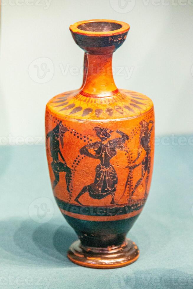 Antique ceramic decorative amphora on a white background photo