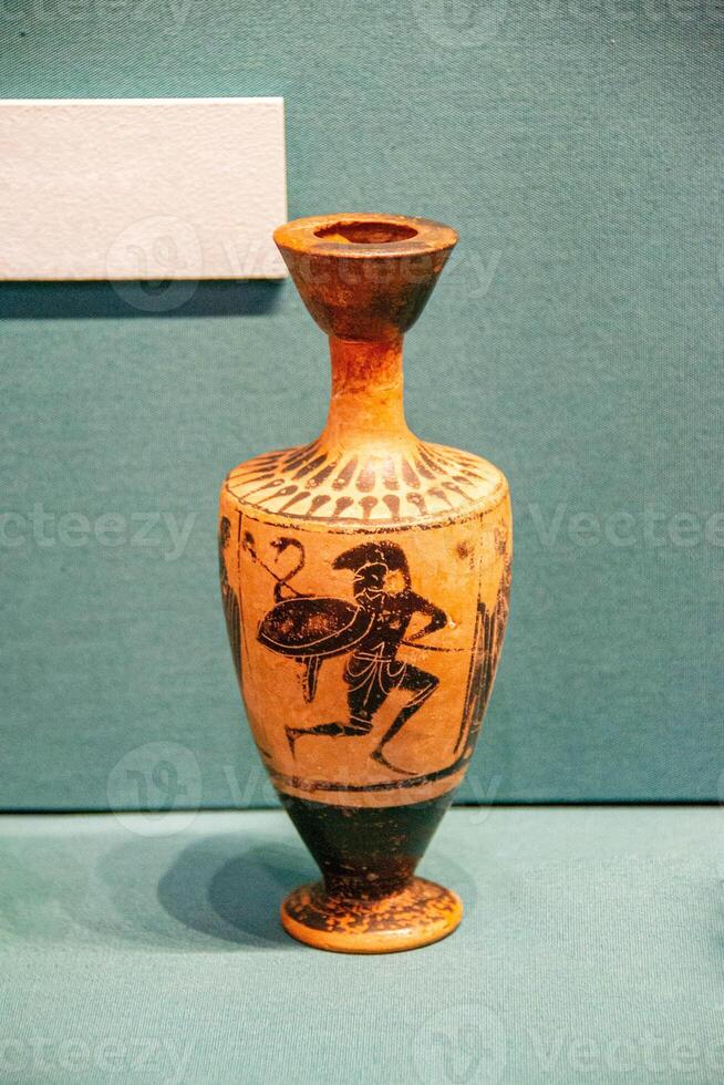Antique ceramic decorative amphora on a white background photo