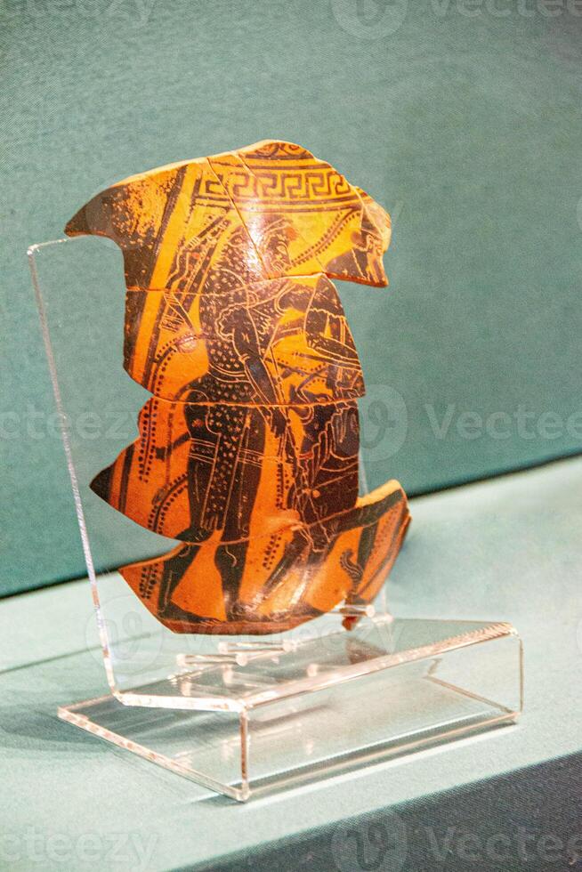 Antique ceramic decorative amphora on a white background photo