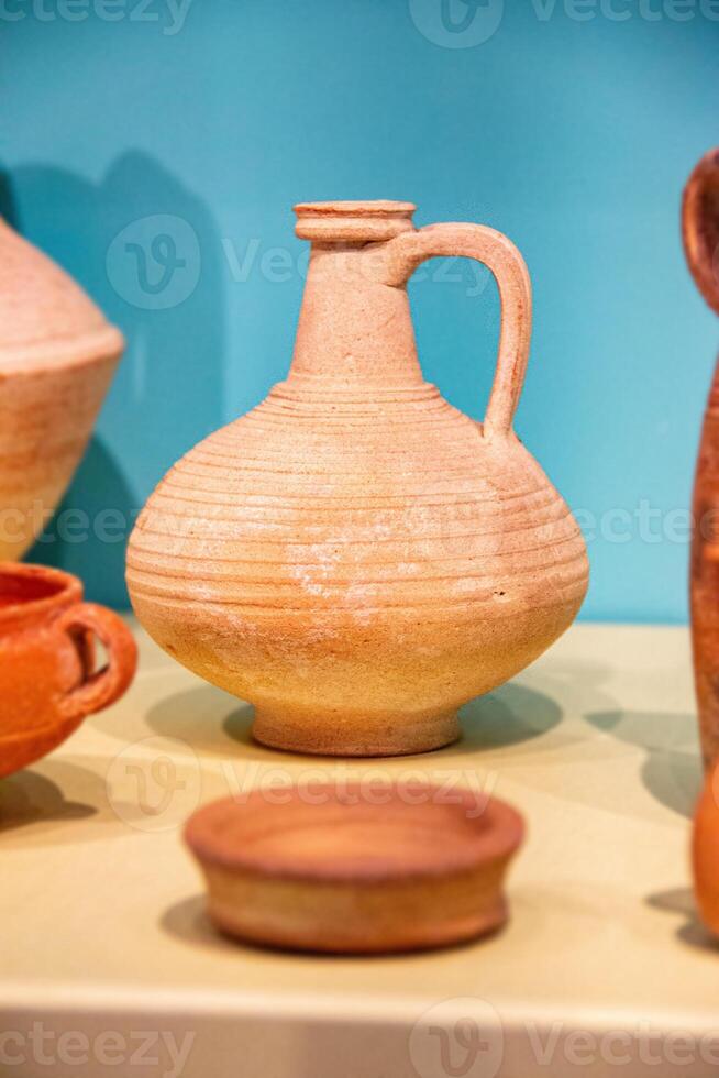 Antique ceramic decorative amphora on a white background photo