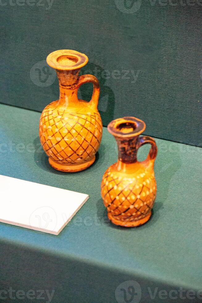 Antique ceramic decorative amphora on a white background photo