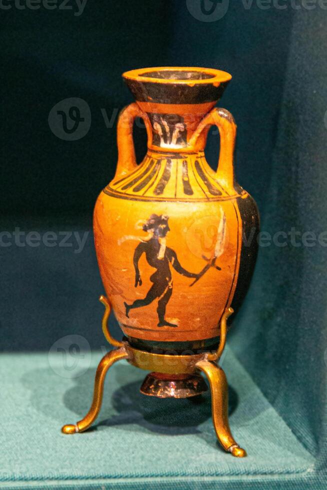 Antique ceramic decorative amphora on a white background photo