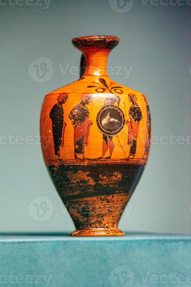 Antique ceramic decorative amphora on a white background photo
