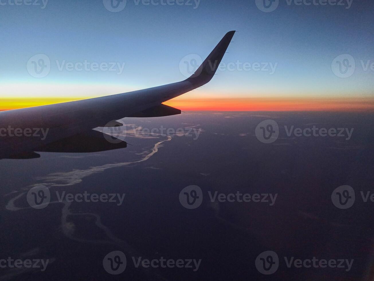 A snapshot of the city at night from the height of the plane's flight photo