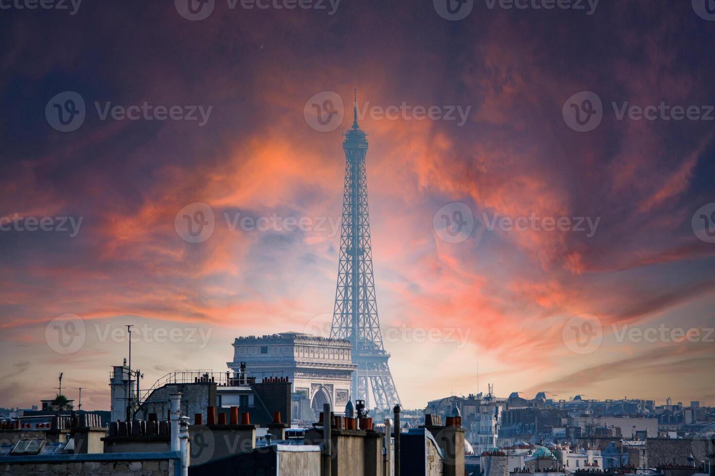 Paris Eiffel Tower and the Arc de Triomphe seen with telephopto photo