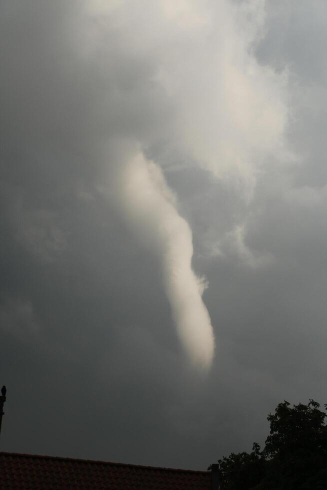 whirlwind, tornado in the sky, doesnt reach the ground photo