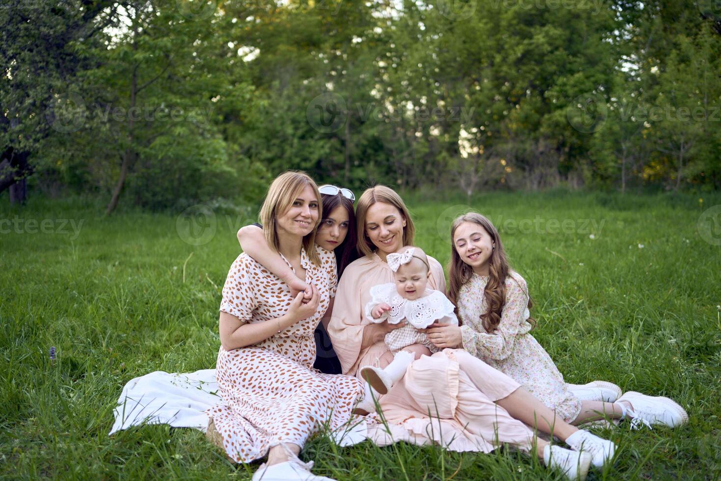 girls' picnic, everyone in pastel dresses except for a teenage girl in black, who was forcibly dragged to the picnic photo