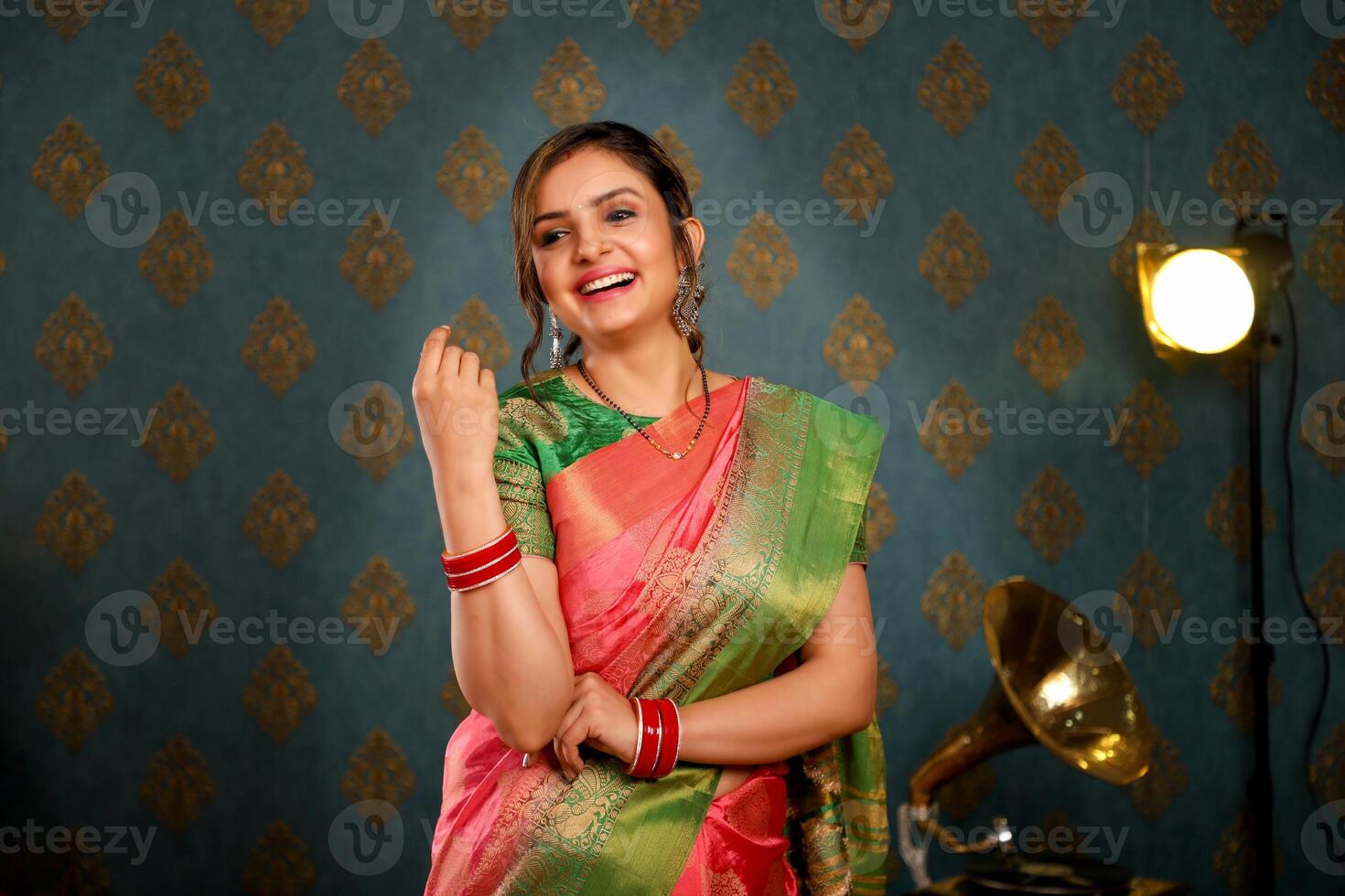 Image Of A Cute Young Lady In An Indian Saree During Diwali Festival Standing In Front Of The Camera photo