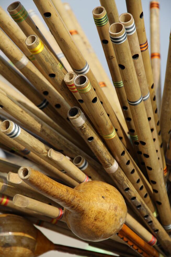 bamboo flutes for sale, varanasi, india photo