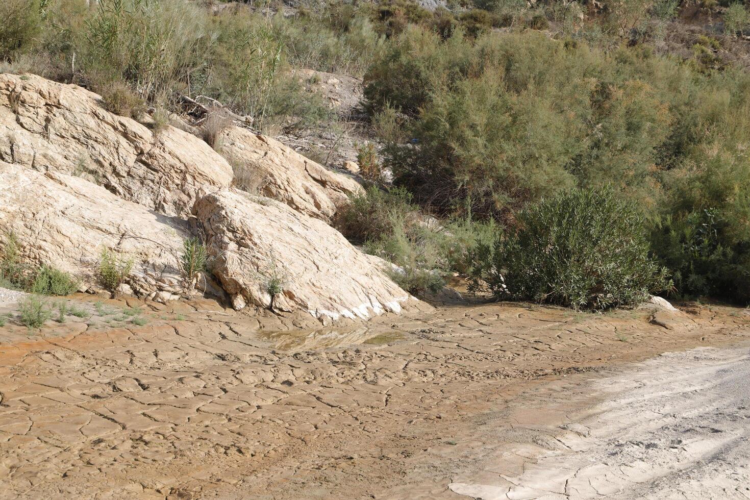 dry mud of the almanzora river, almeria photo