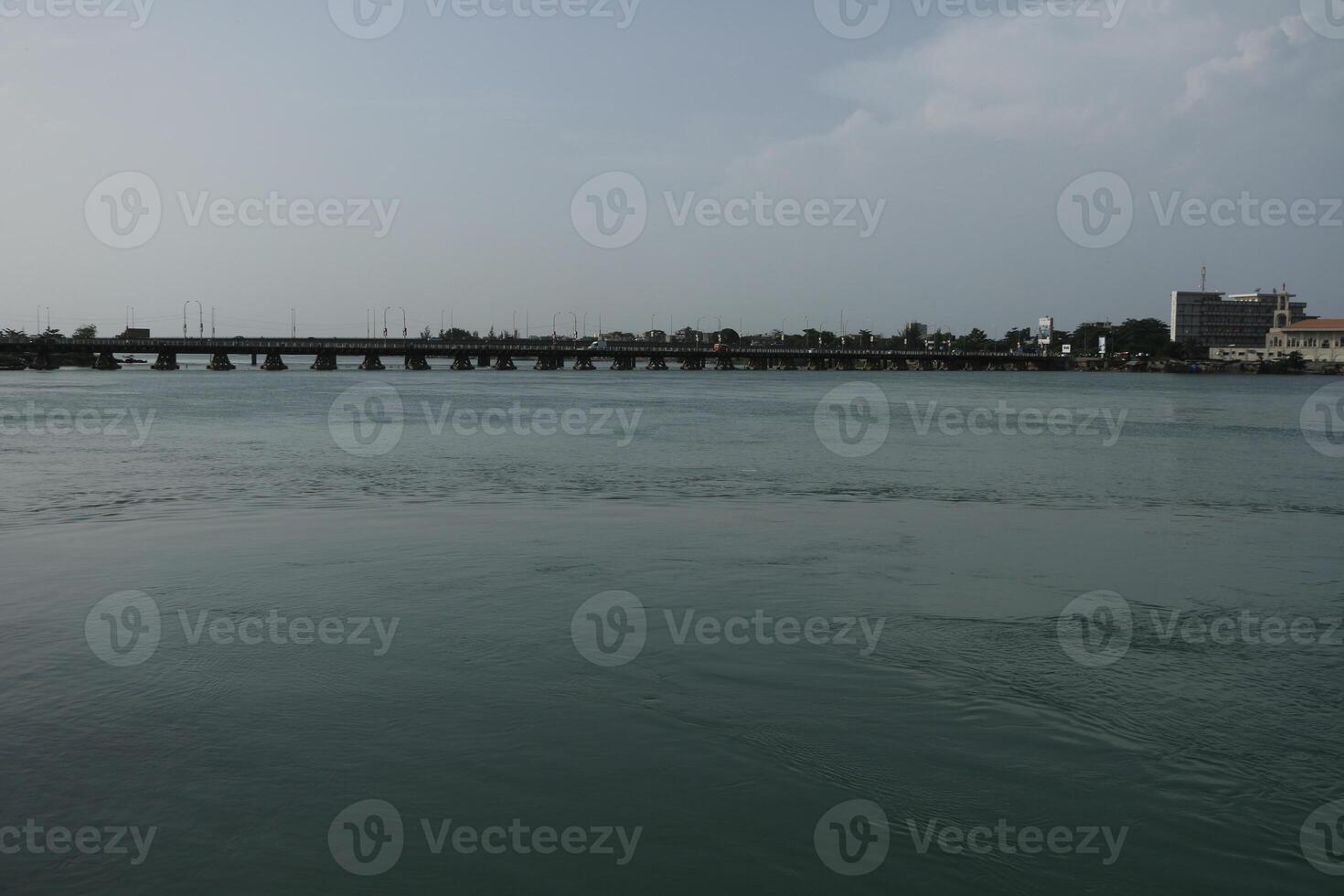 river and view on bridge in Cotonou, Benin photo