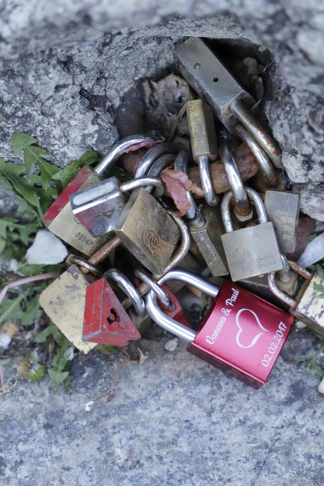 turned out into a tradition for lovers, put a padlock on a stone, fence or something else photo