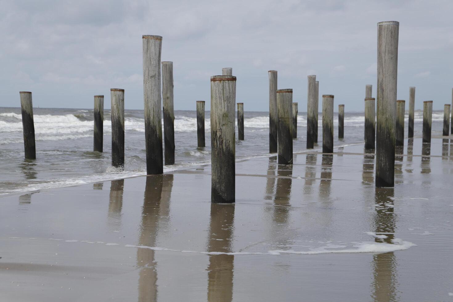 pole village, this was the location of the former village Petten, before it was taken by the sea,village petten at the north sea, the netherlands, photo
