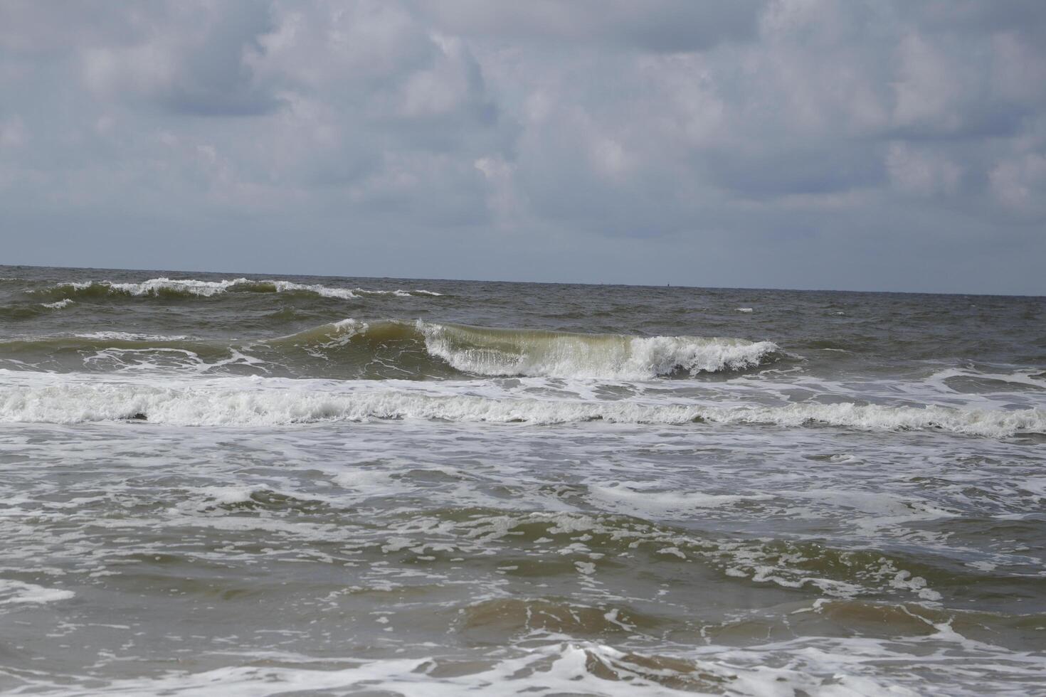 rough sea, village petten at the north sea, the netherlands, photo