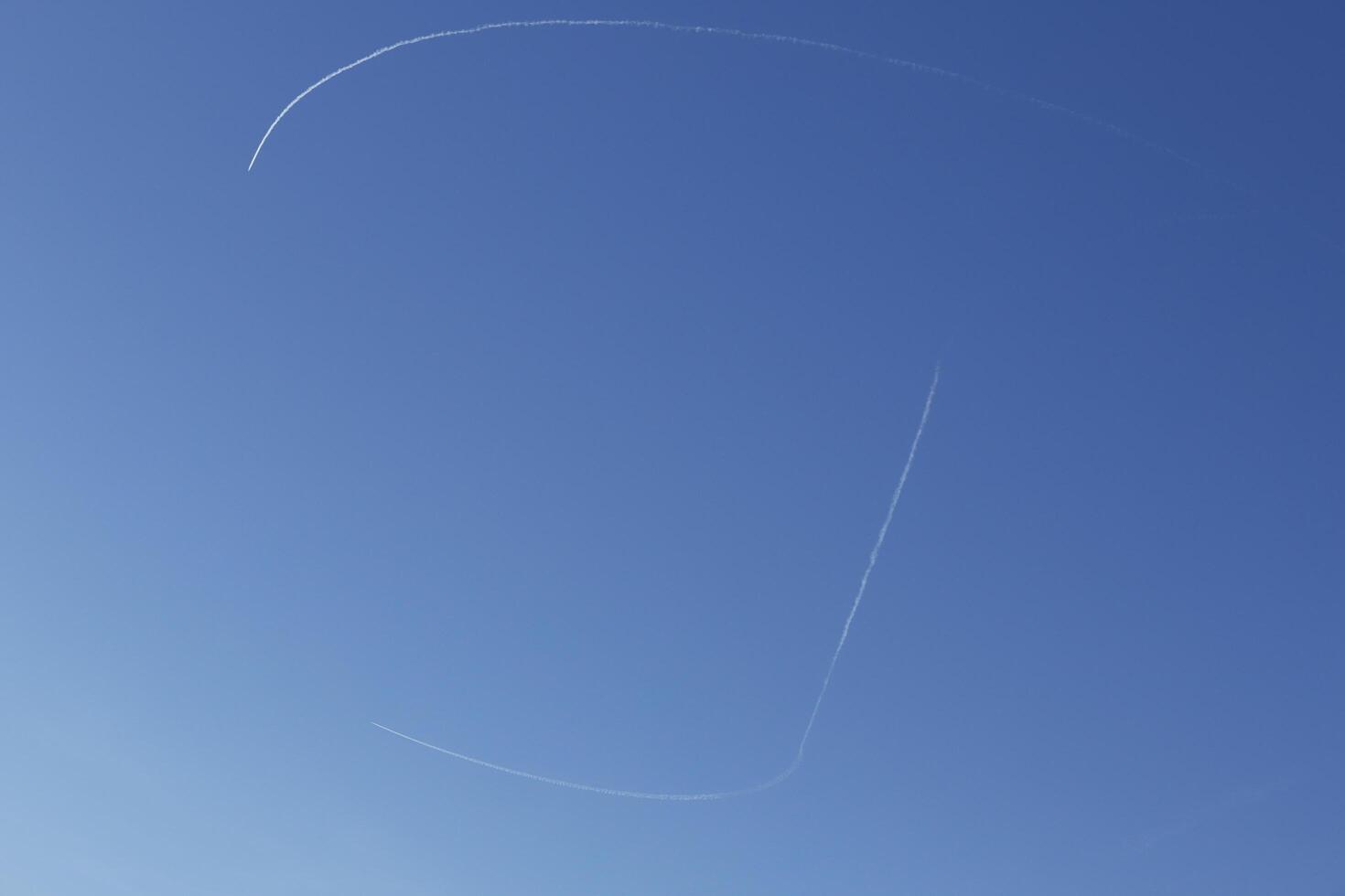 airplane stripes in the air photo