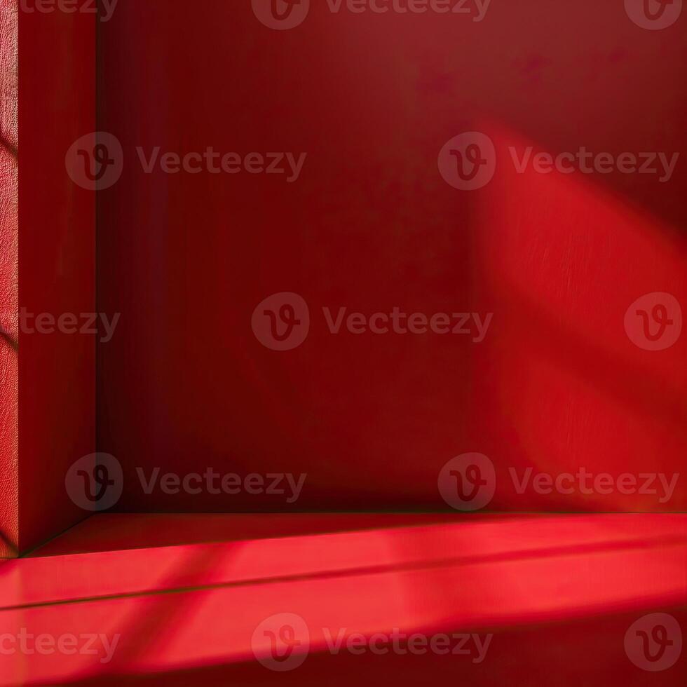 red room with a single light shining through a window. The room is empty and has a minimalist design. photo