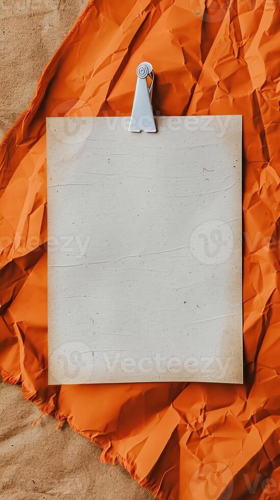 a close up of a glamping bulletin board of an blank piece of paper in the center, orange and white color theme photo