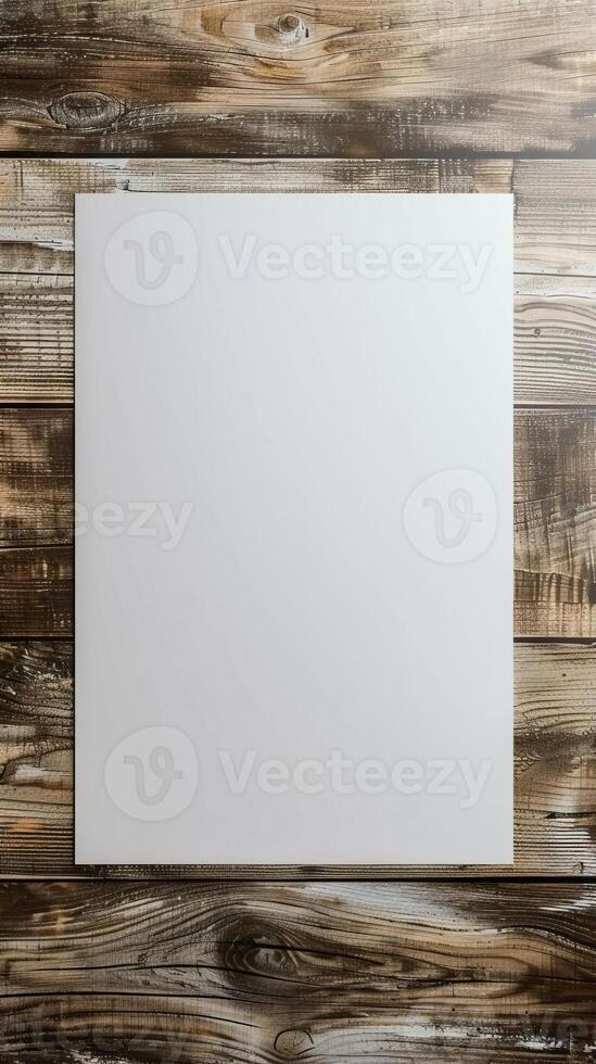 mockup, a white sheet of white poster in a corner on a wooden table photo