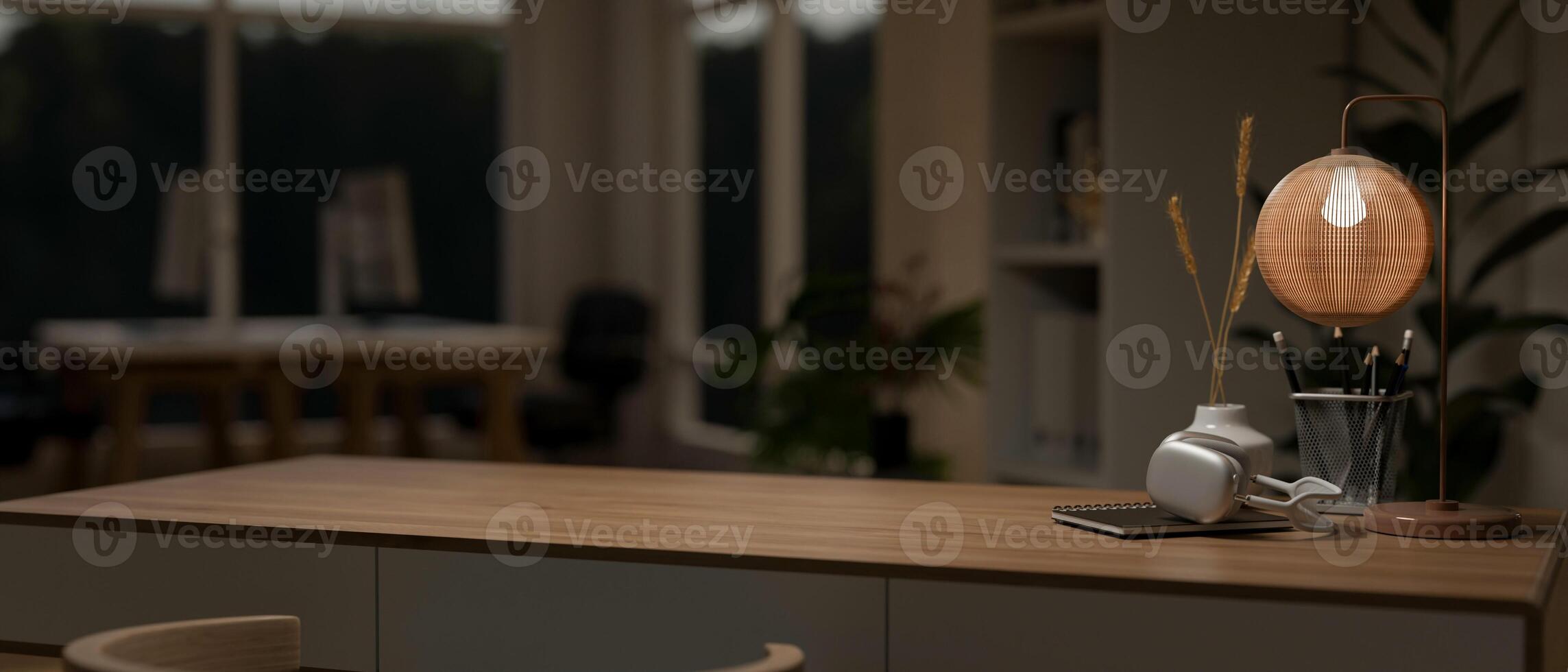 A modern home office at night with a space to display your product on a minimal wooden table. photo