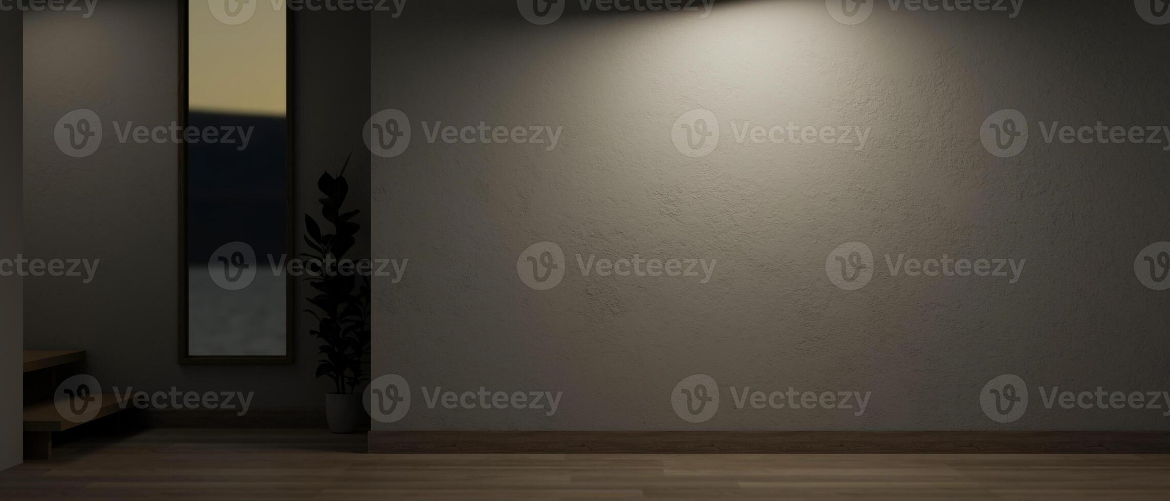 A modern empty room at night with a dim light on the white wall, parquet floor, and a window. photo