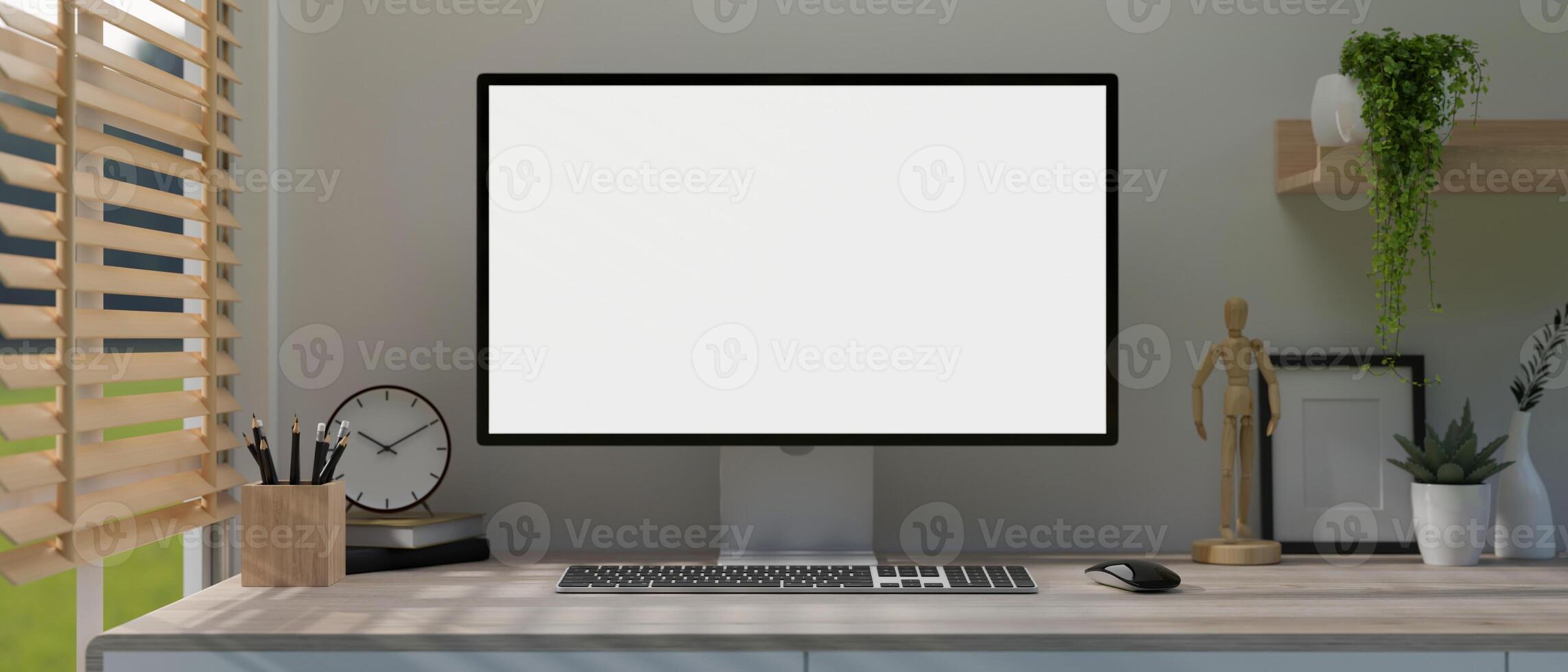 A modern, minimal white home office workspace with a white-screen computer mockup on a table. photo
