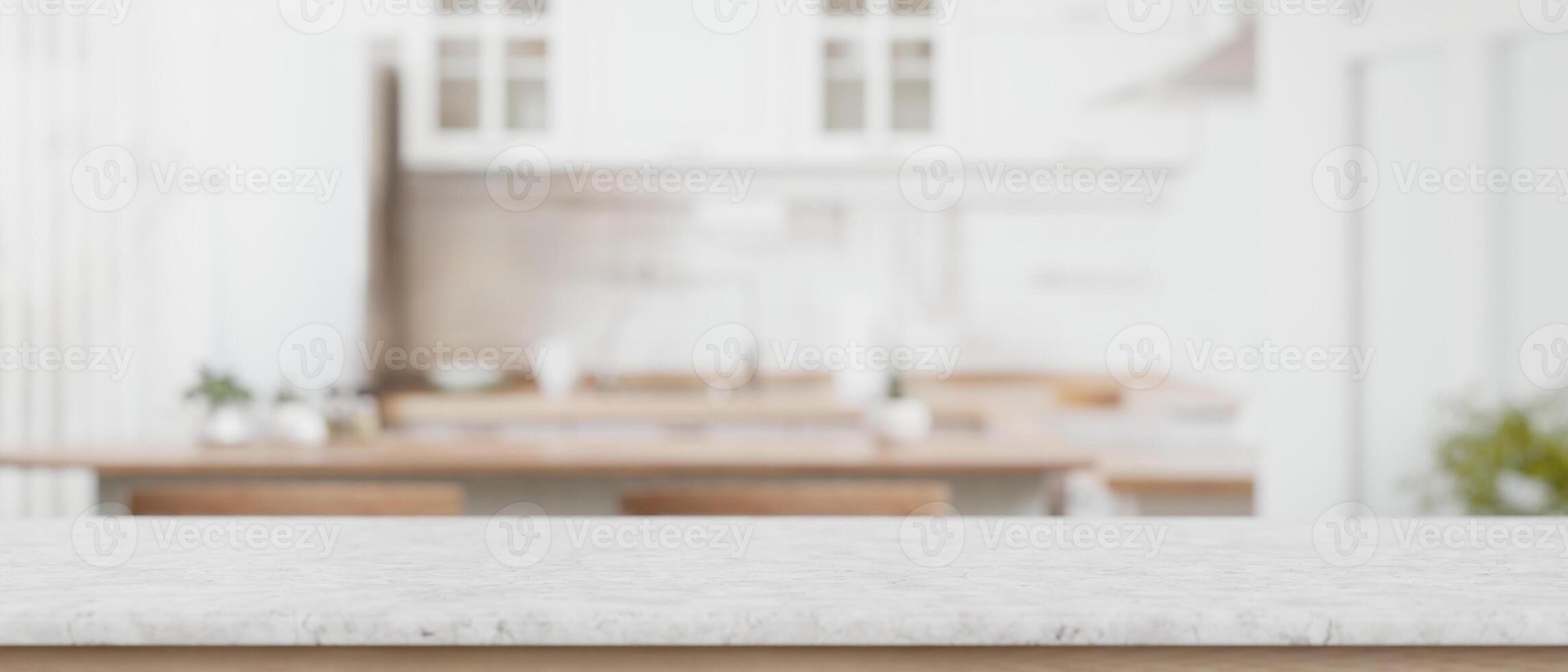 Marble counter top with empty space for display product with blurred background of a modern kitchen. photo