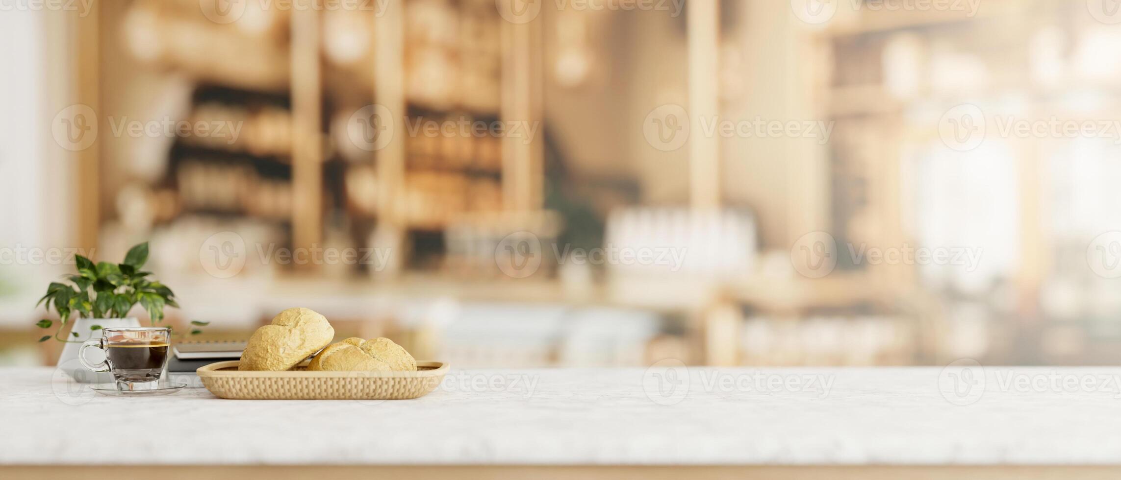 A white table features a bread basket and a coffee cup in a contemporary restaurant or coffee shop. photo