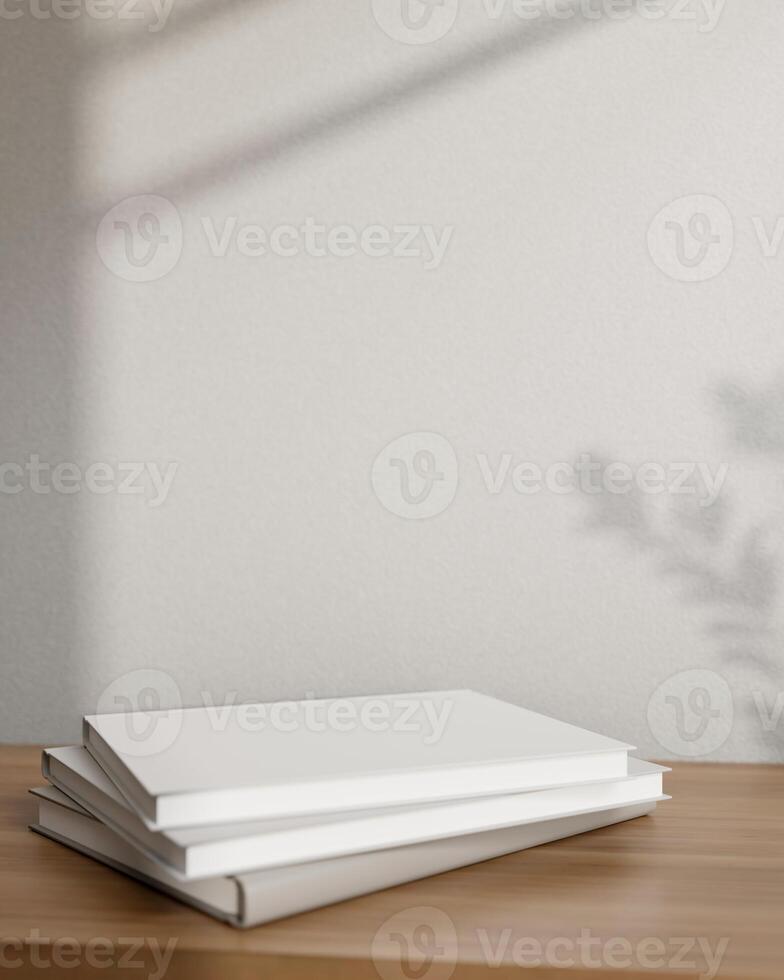 Books on a wooden table against the grey wall with daylight shadow. Pedestal for showcasing products photo