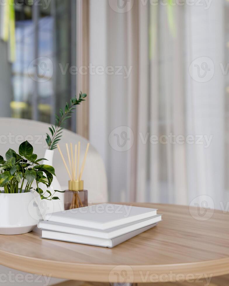 A round wooden table near in a contemporary room features books and decor plants on the table. photo