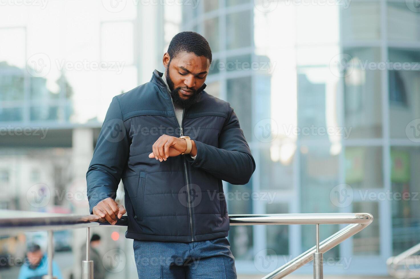 African American man in stylish new clothes on the street photo