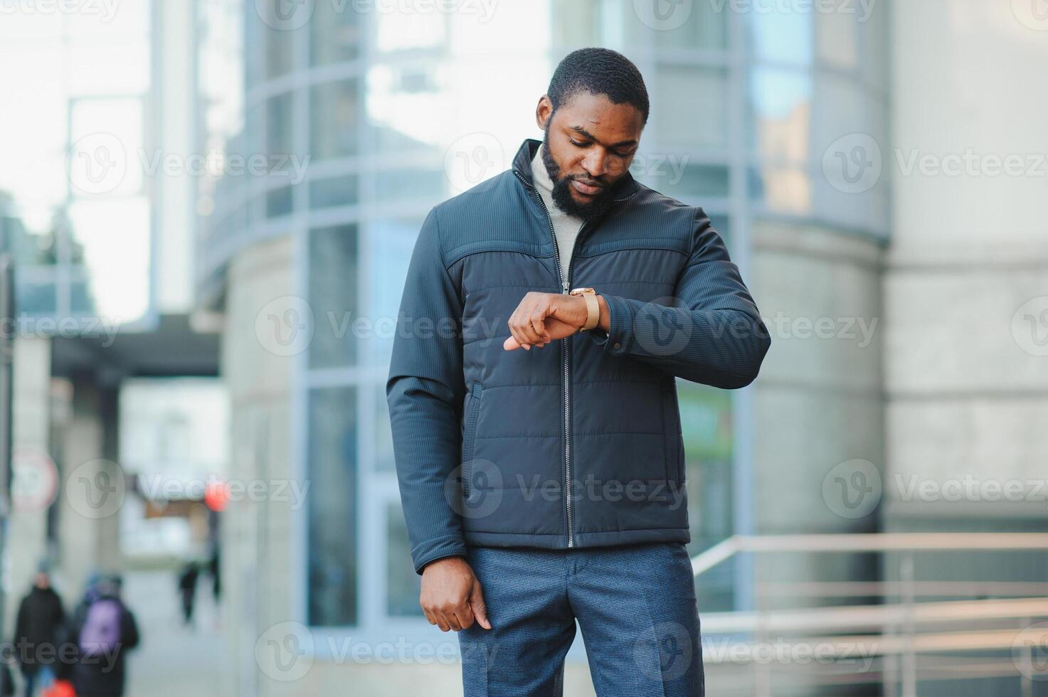 African American man in stylish new clothes on the street photo