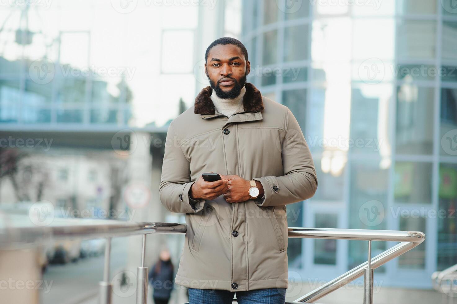 African American man in stylish new clothes on the street photo