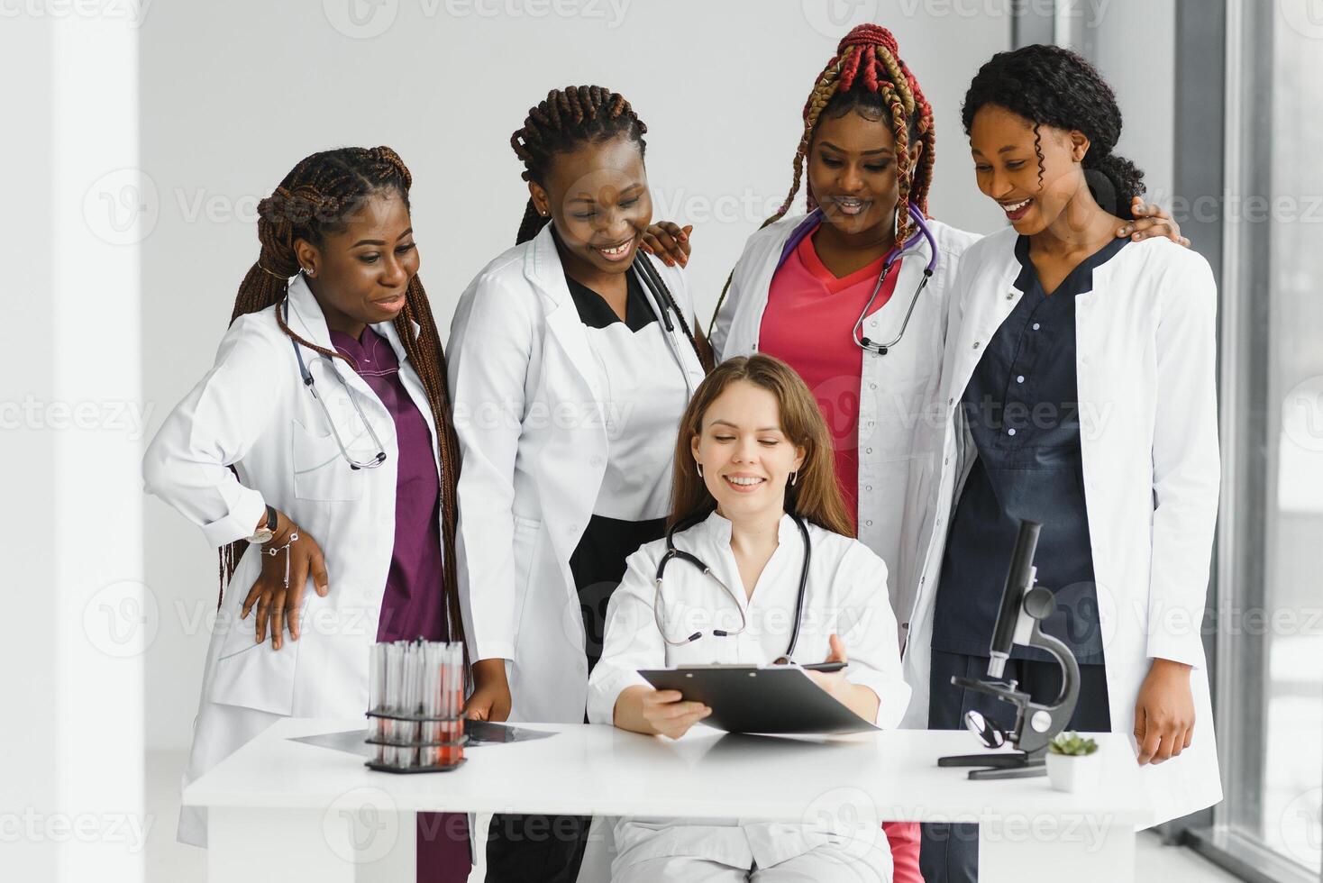Group of doctors and nurses set in a hospital photo