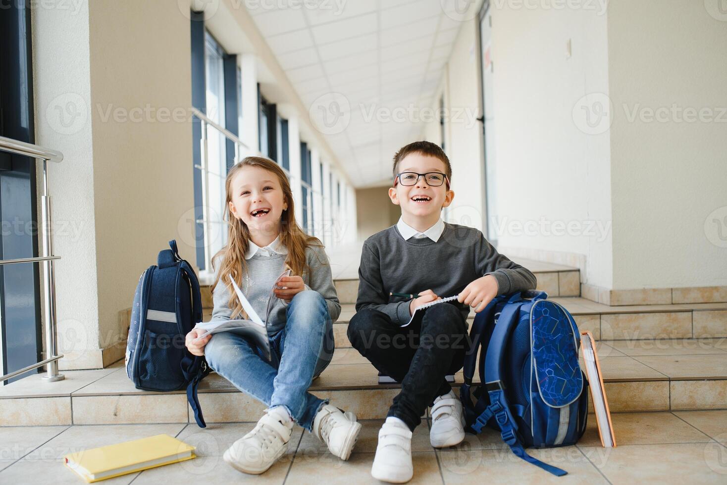School kids in uniform together in corridor. Conception of education. photo