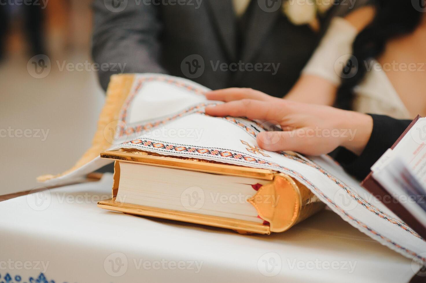 Priest during a wedding ceremony - nuptial mass. photo