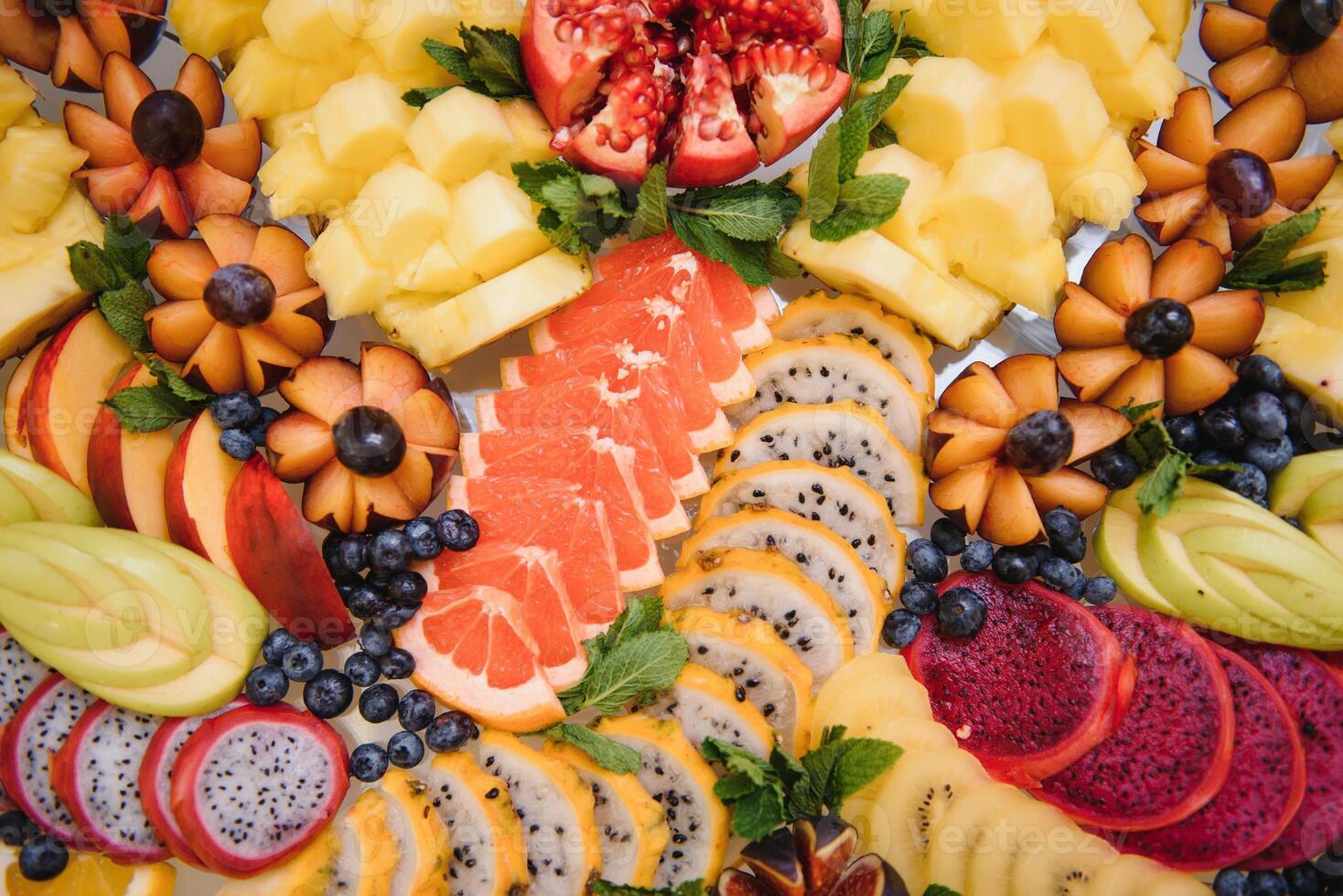 various dessert with fresh fruit on buffet line, sweet. photo