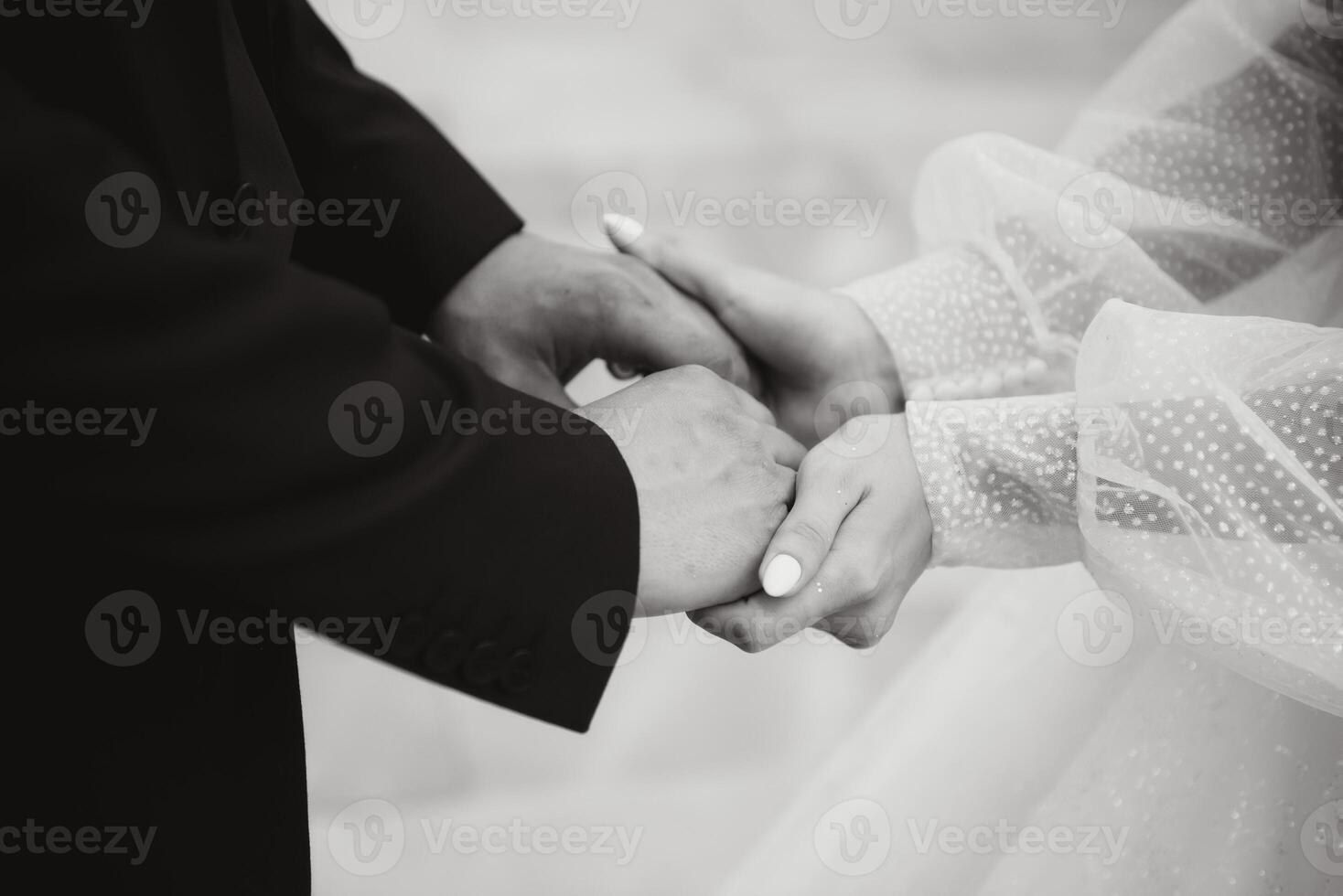 Hands of the bride and groom close-up. photo