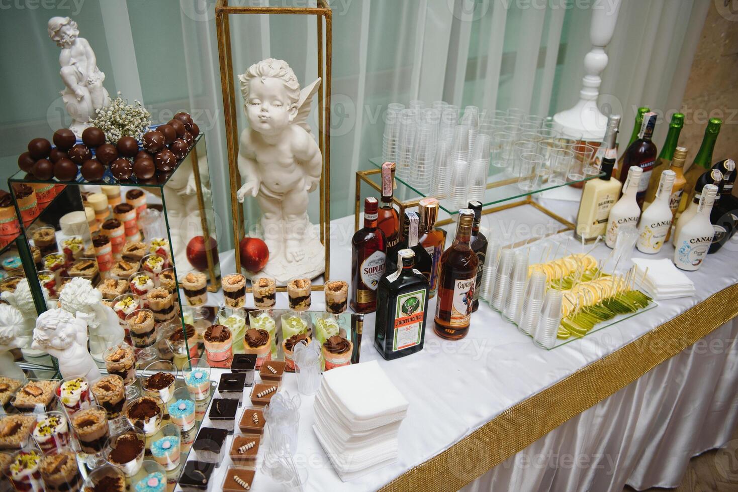 various dessert with fresh fruit on buffet line, sweet. photo