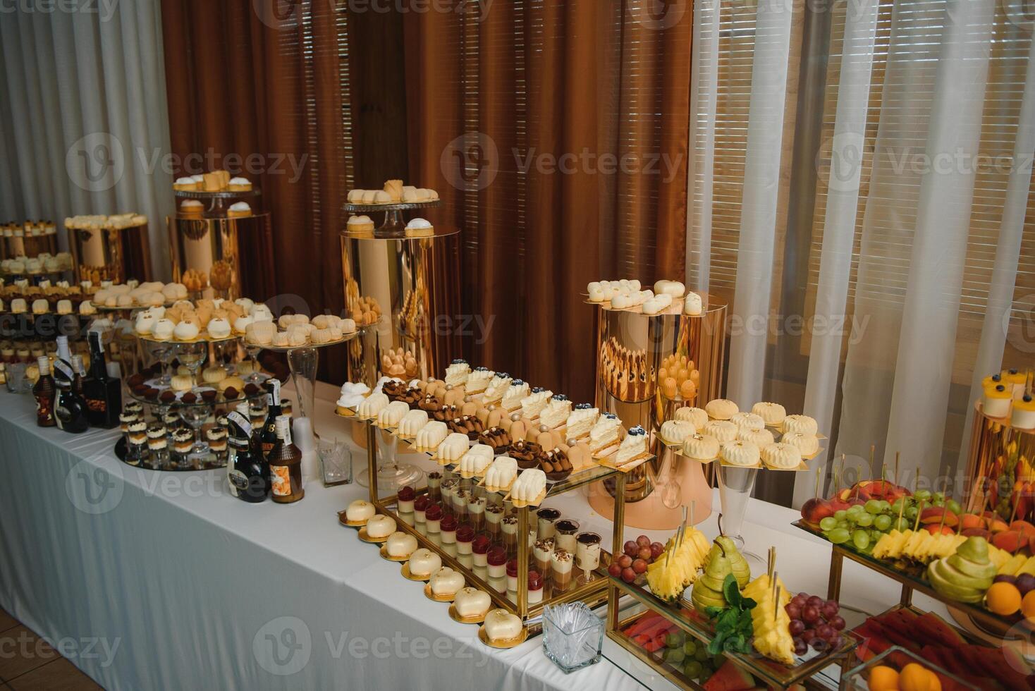 various dessert with fresh fruit on buffet line, sweet. photo