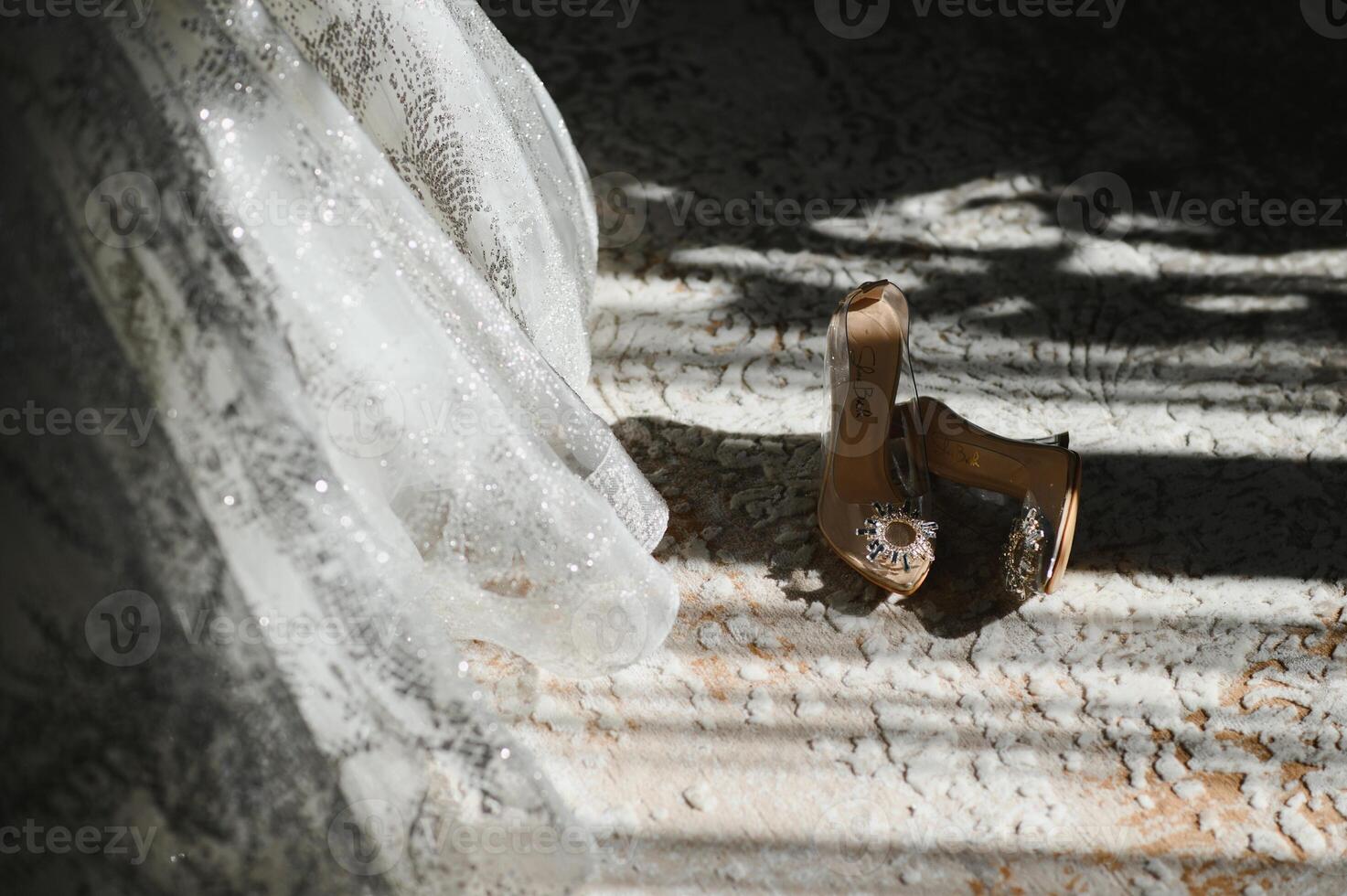 Bride dressing wedding gown. morning bride. photo