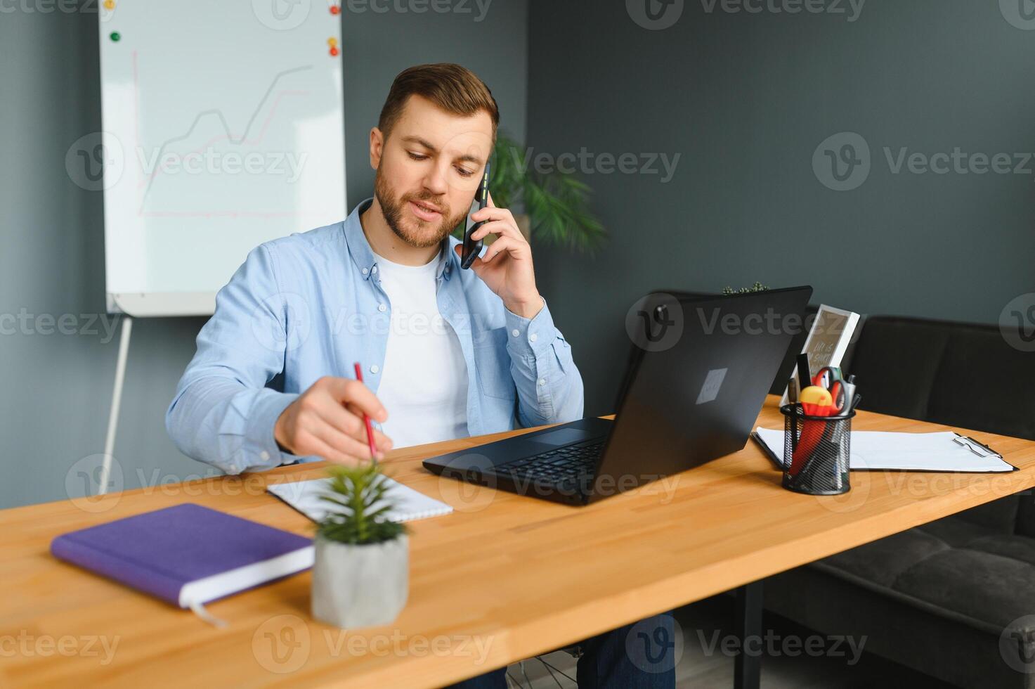 Computer Programmer Writing Program Code On Computer In Office photo