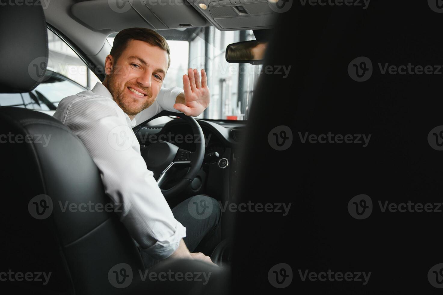 transport, vehicle and taxi concept - male driver photo