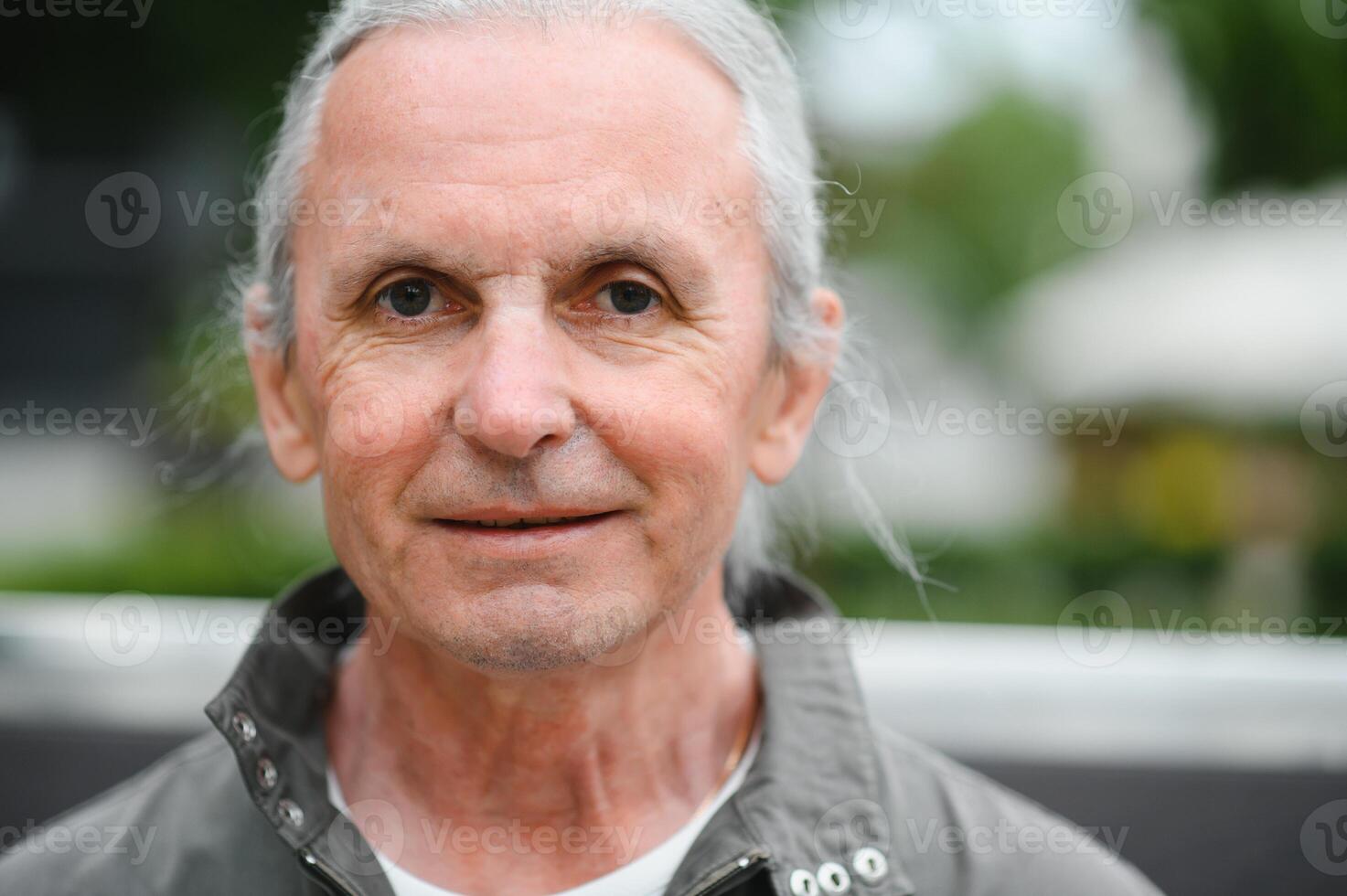 older man have good time in the park photo