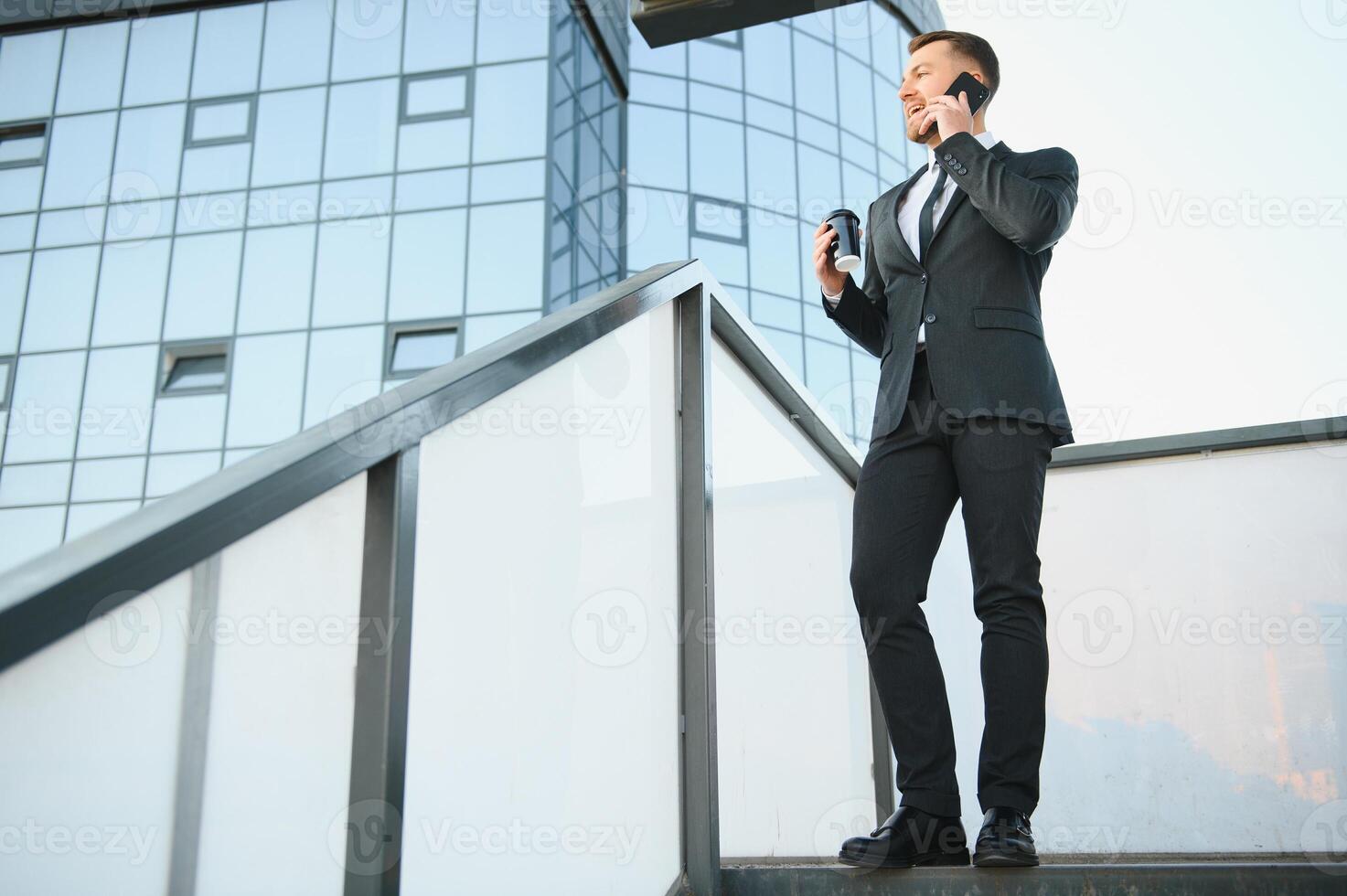 Portrait of an handsome businessman in an urban setting photo