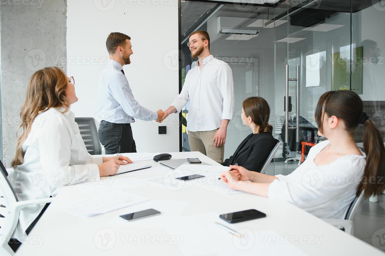 A group of business people partners during a set team meeting in the modern office. Teamwork concept photo