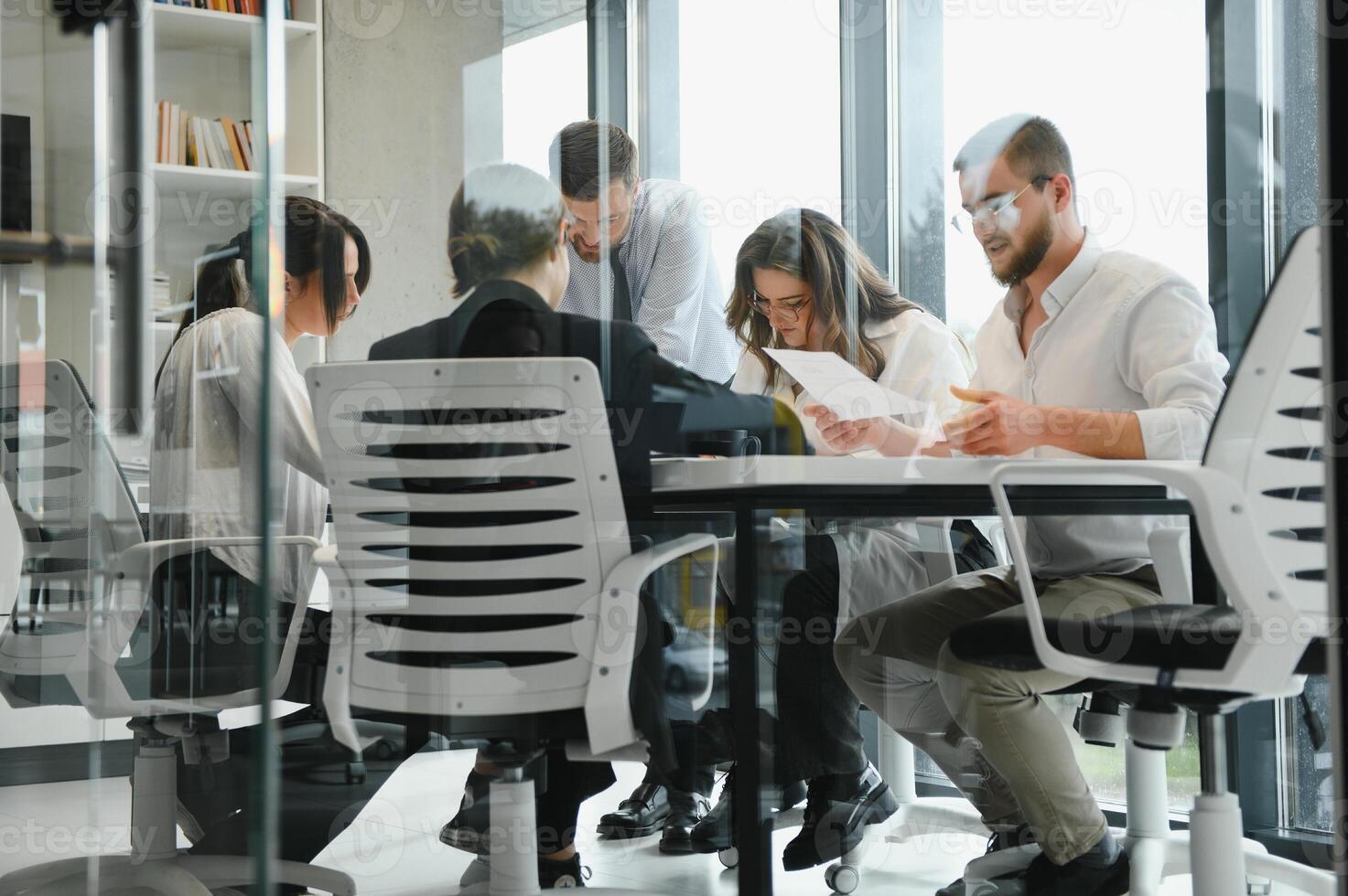 Corporate business team and in a meeting at modern office with big windows . High quality photo