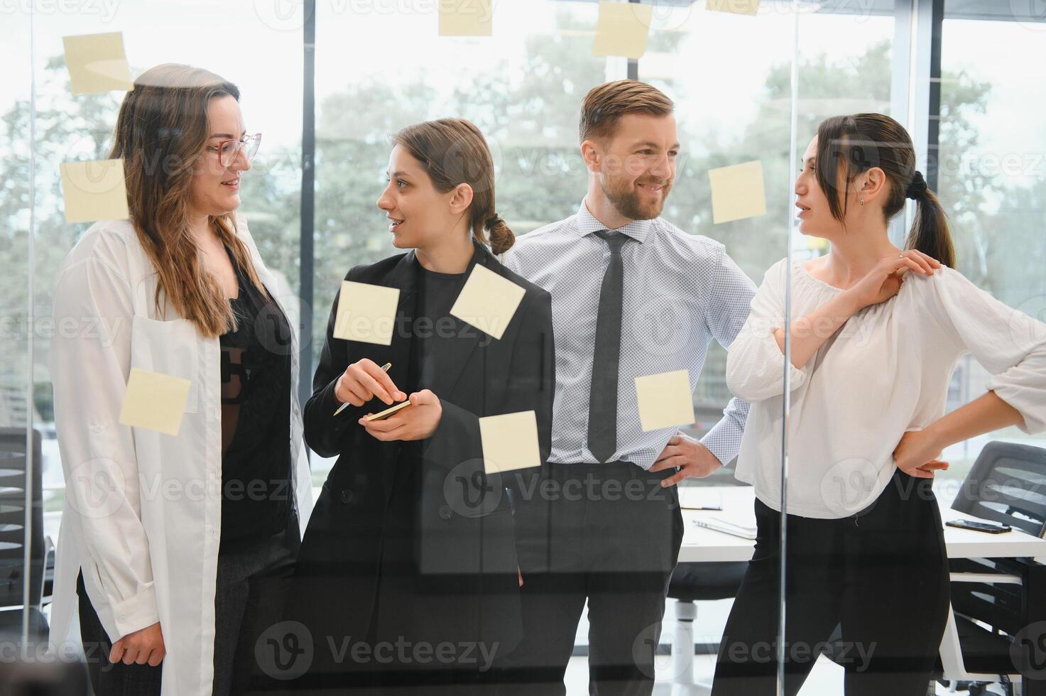 Group of young people in business meeting photo