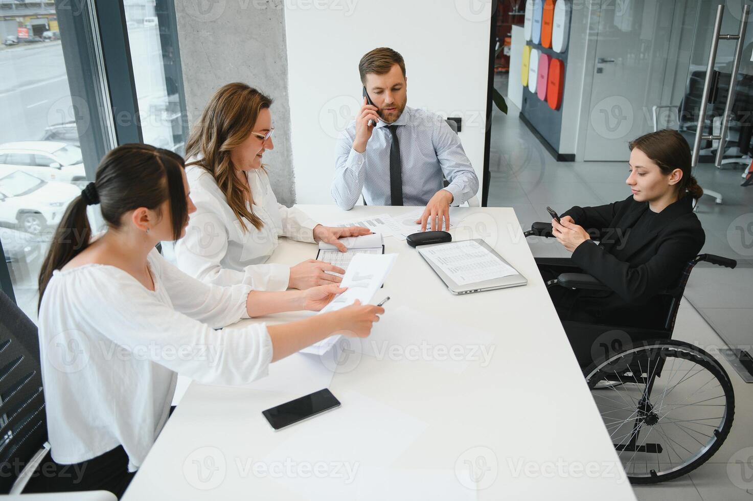 A group of business people partners during a set team meeting in the modern office. Teamwork concept photo